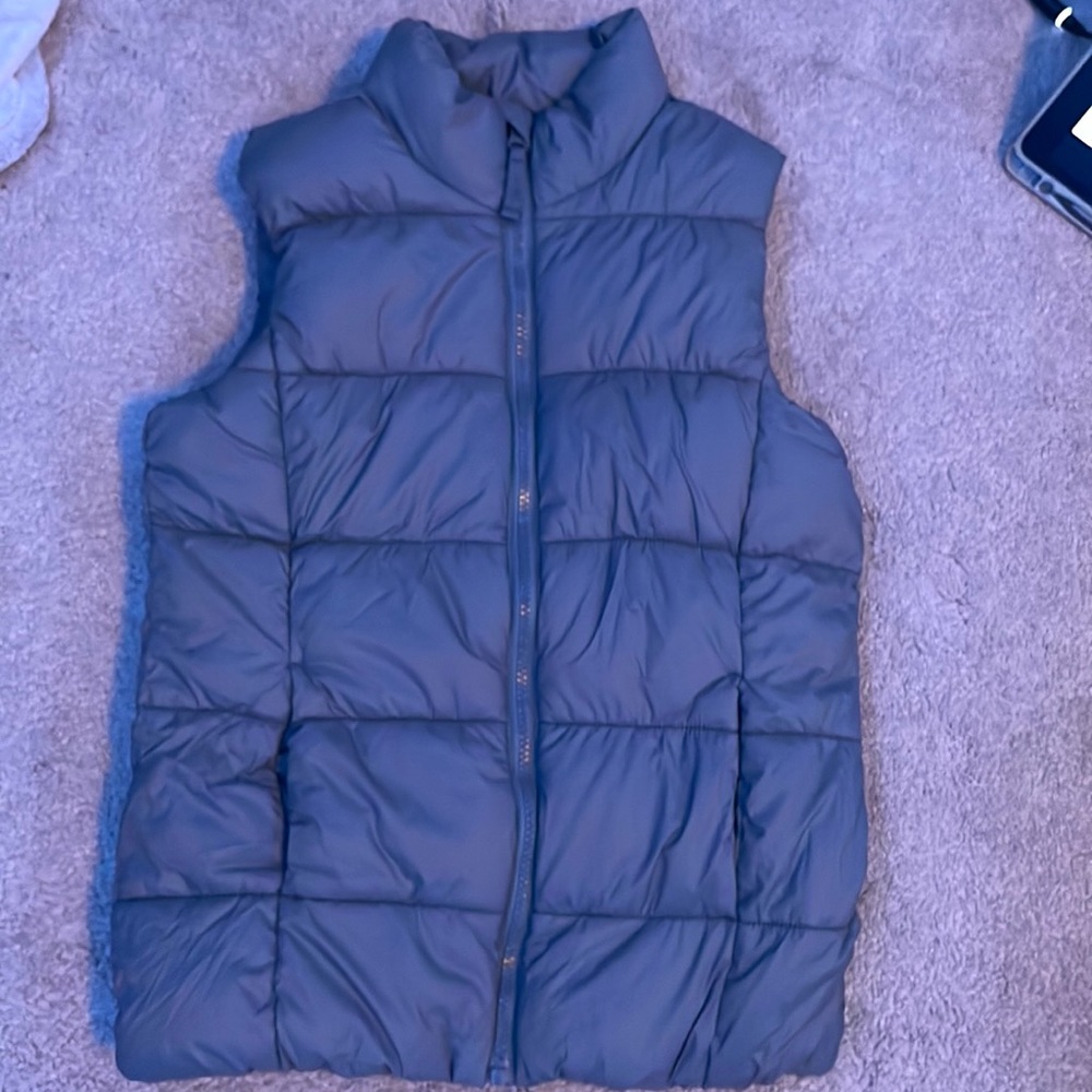 Vest never worn just ripped off tag